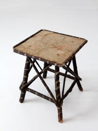antique Adriondack twig table with floral top