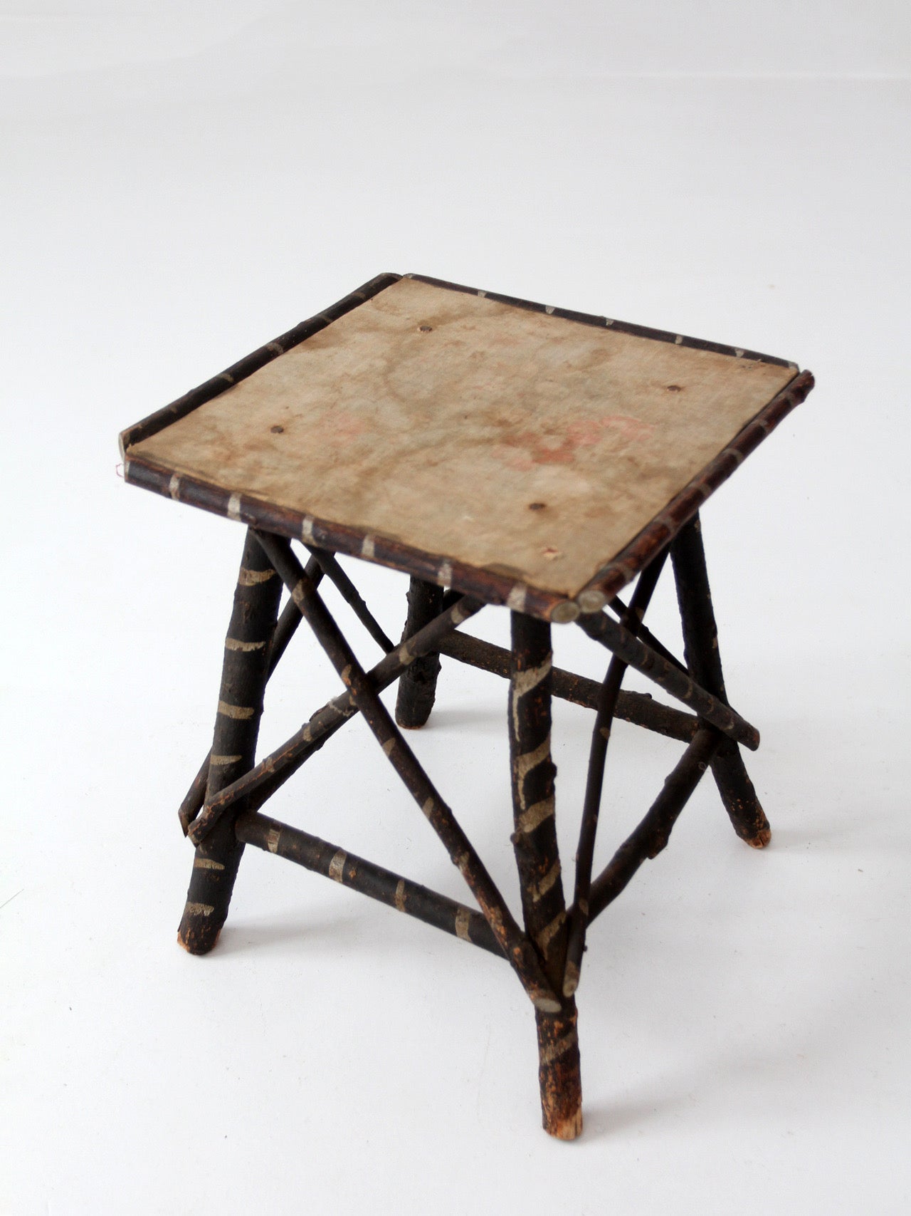 antique Adriondack twig table with floral top