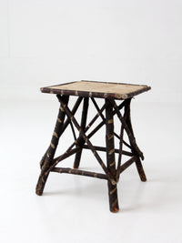 antique Adriondack twig table with floral top