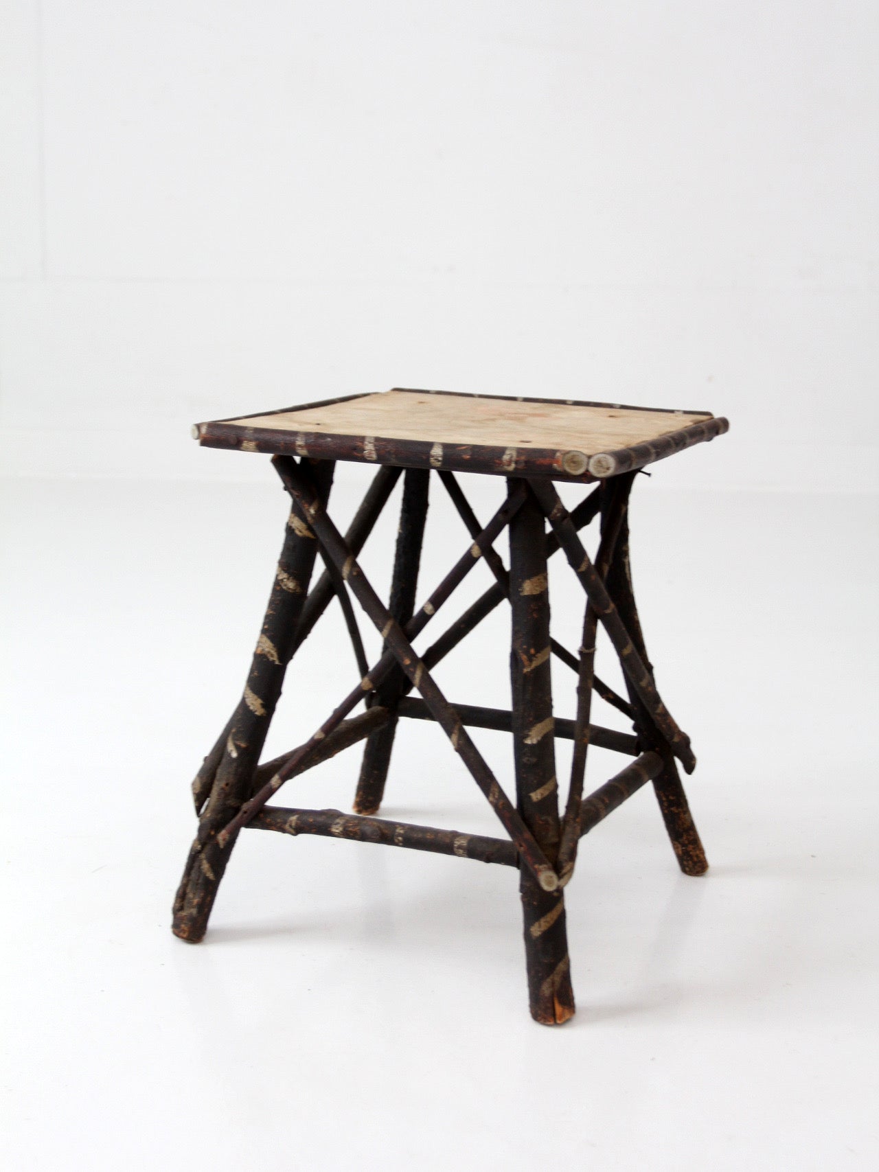 antique Adriondack twig table with floral top