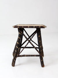 antique Adriondack twig table with floral top
