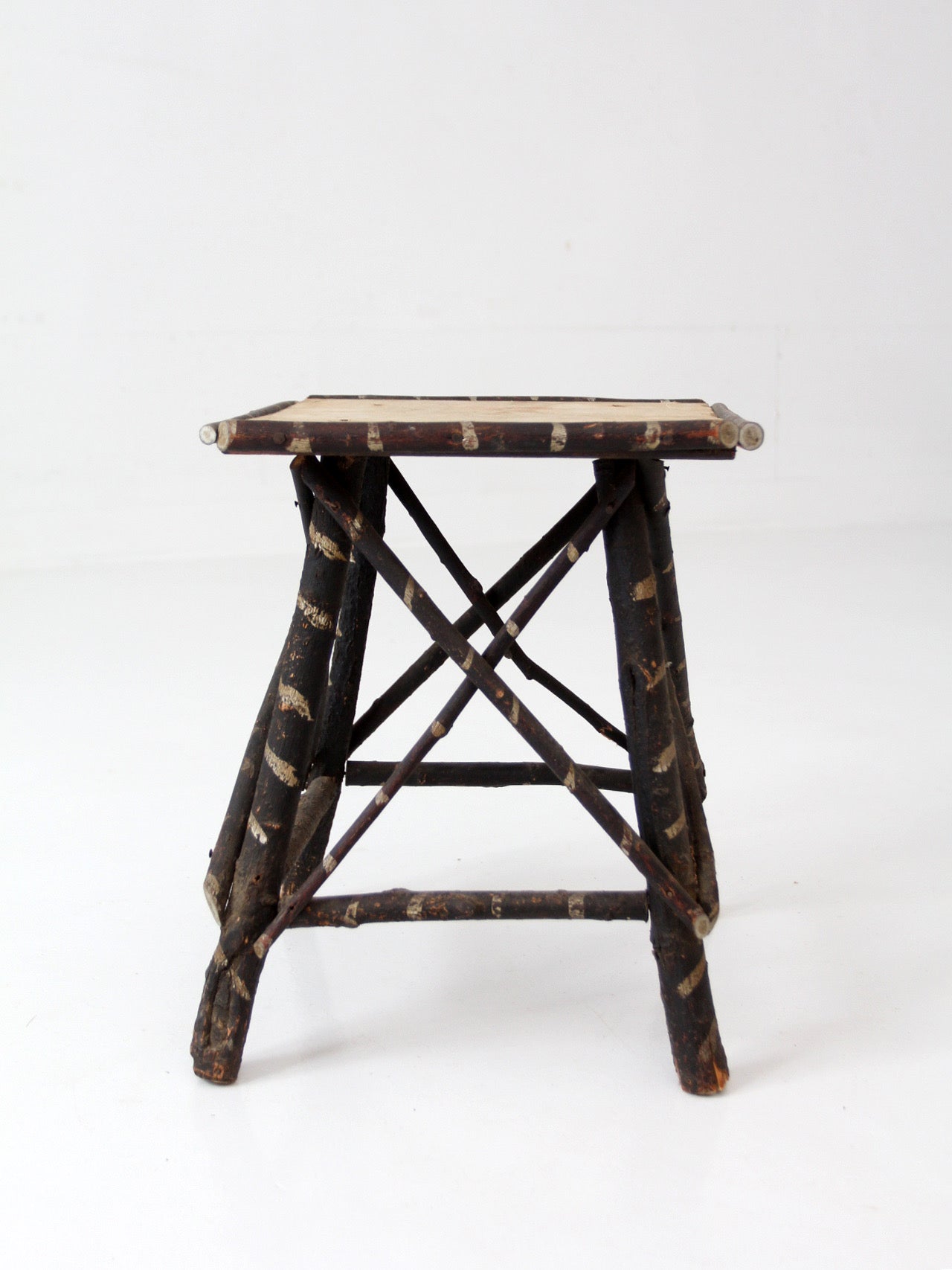 antique Adriondack twig table with floral top