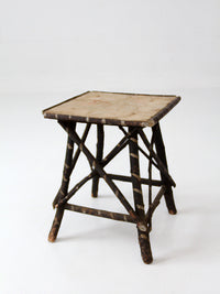 antique Adriondack twig table with floral top