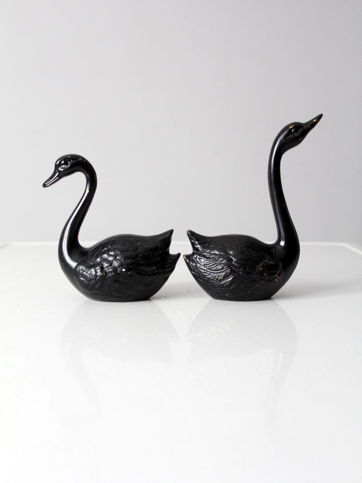 mid century painted black brass swans pair