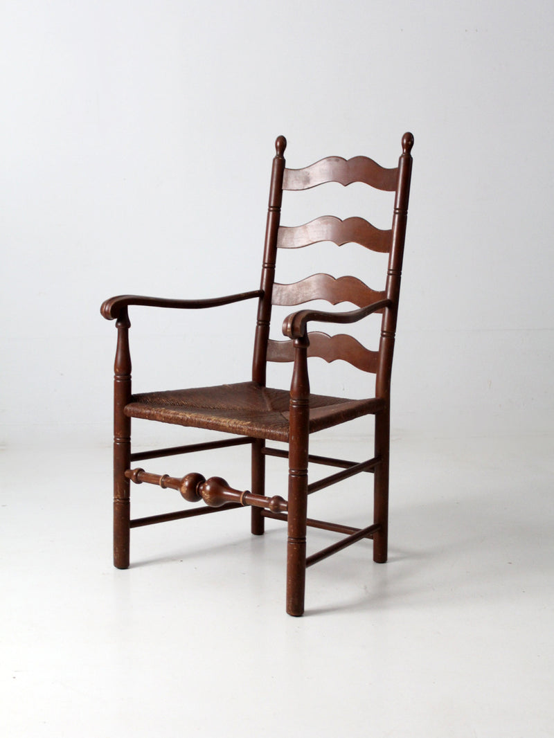 antique rush seat wooden arm chair