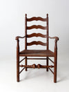 antique rush seat wooden arm chair