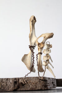 primitive folk art bone sculpture