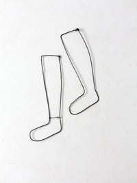 antique children's sock stretcher displays