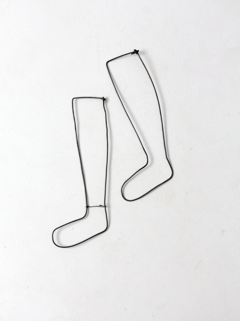 antique children's sock stretcher displays