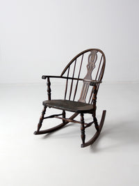 antique Windsor rocking chair with rush seat