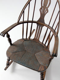 antique Windsor rocking chair with rush seat