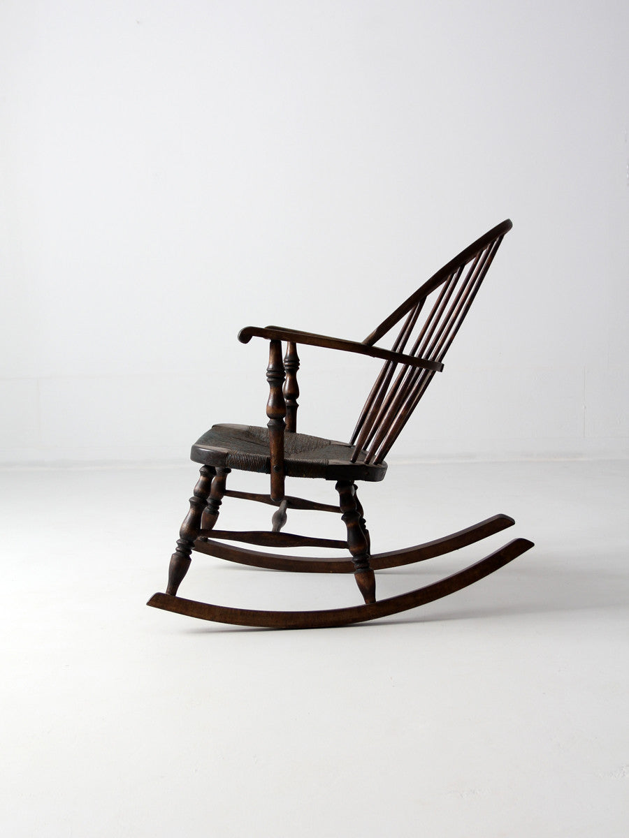antique Windsor rocking chair with rush seat