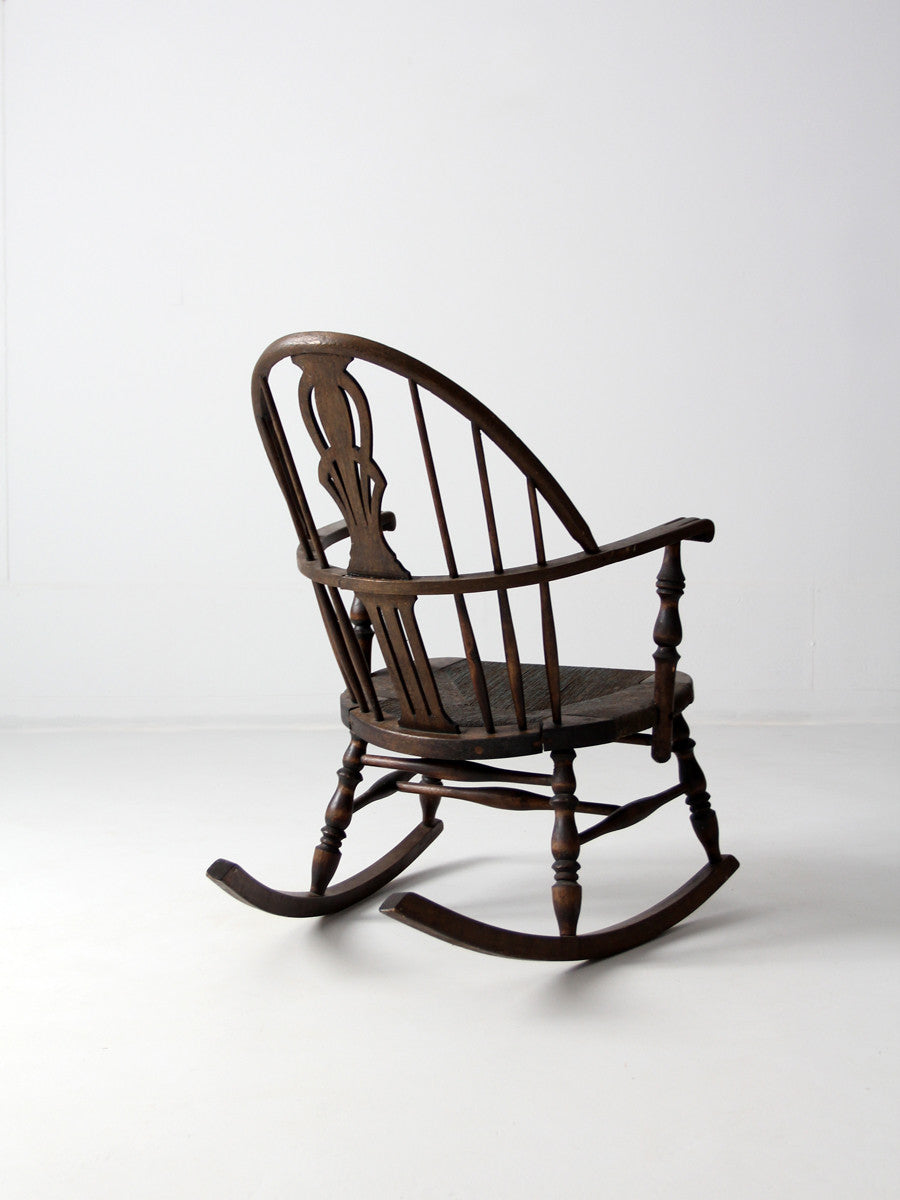 antique Windsor rocking chair with rush seat