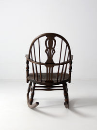 antique Windsor rocking chair with rush seat