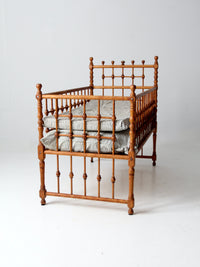 antique Victorian wooden frame bed