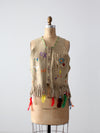vintage painted leather vest with feathers