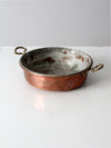 antique copper pan with brass handles