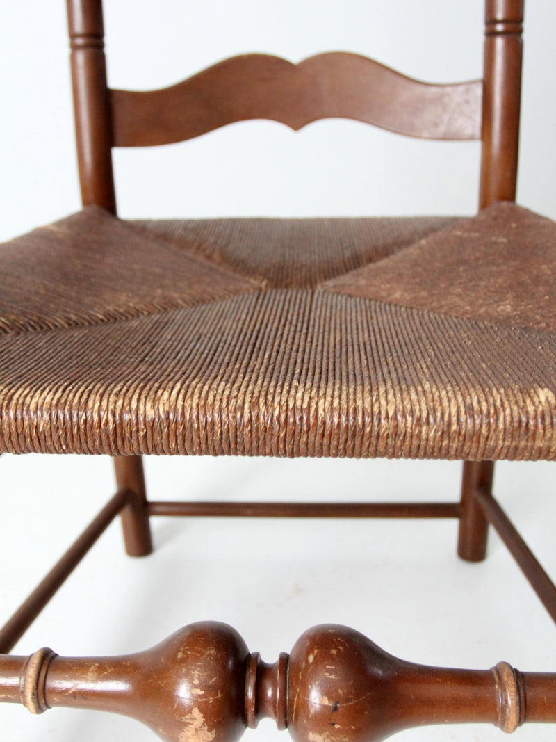 antique rush seat wooden arm chair