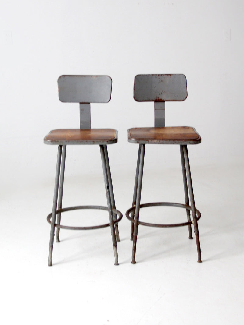 mid century industrial stools pair