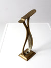 antique brass shoe rest stand