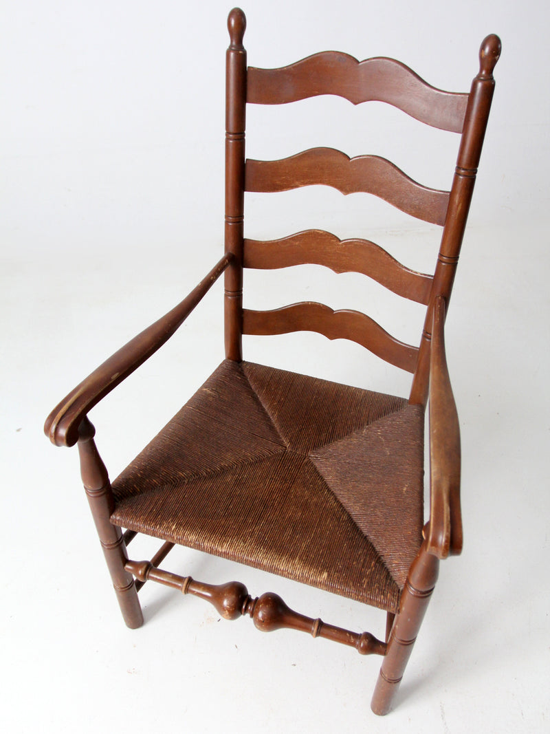 antique rush seat wooden arm chair