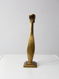 antique brass shoe rest stand