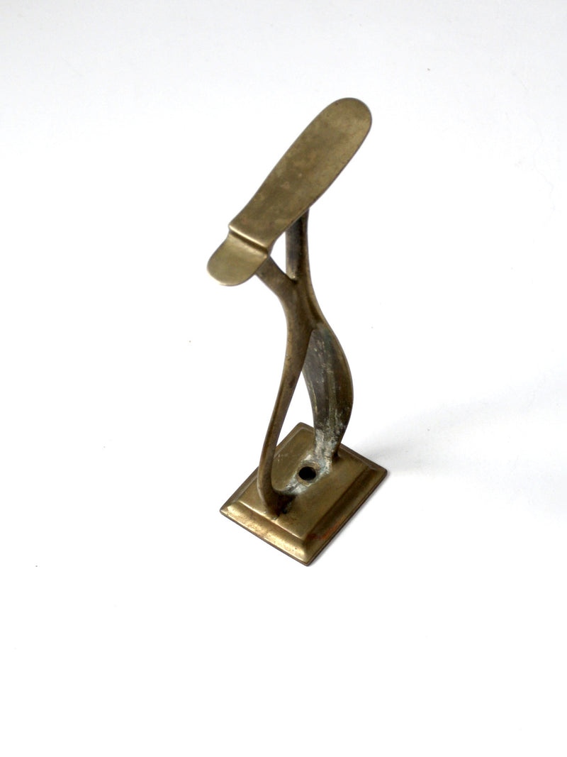 antique brass shoe rest stand