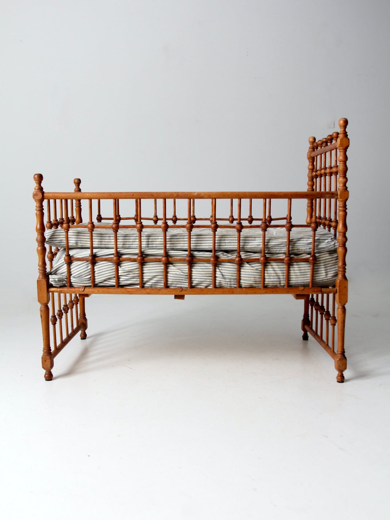 antique Victorian wooden frame bed