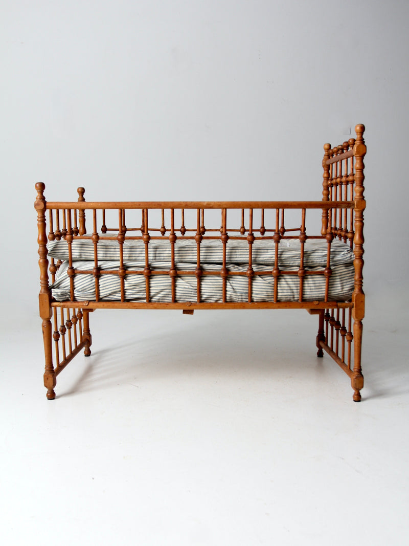 antique Victorian wooden frame bed