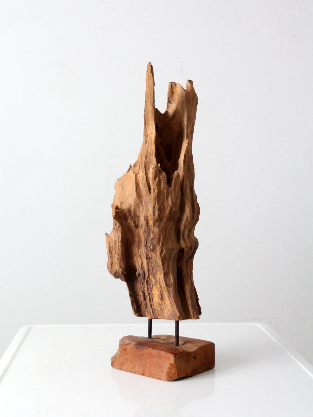mid-century wood sculpture on stand