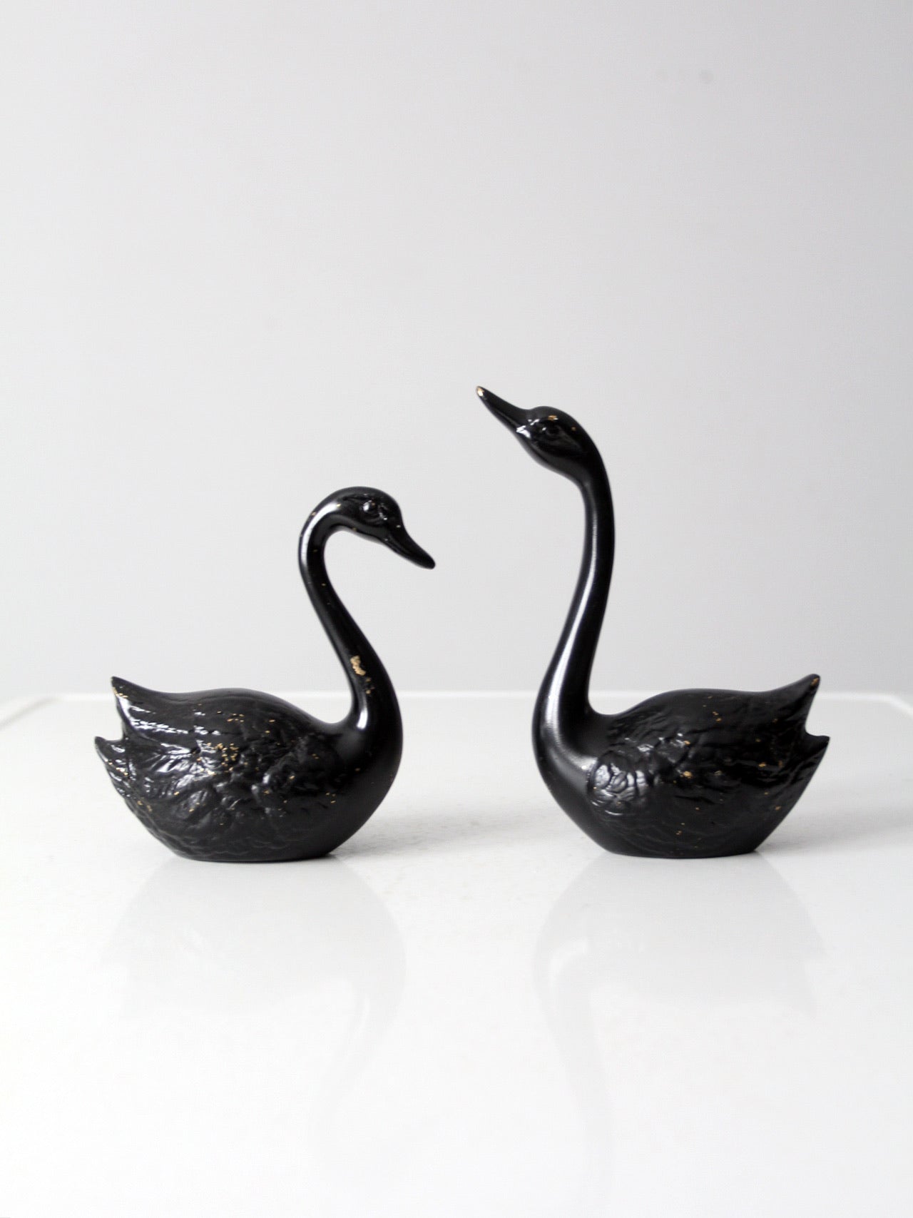 mid century painted black brass swans pair