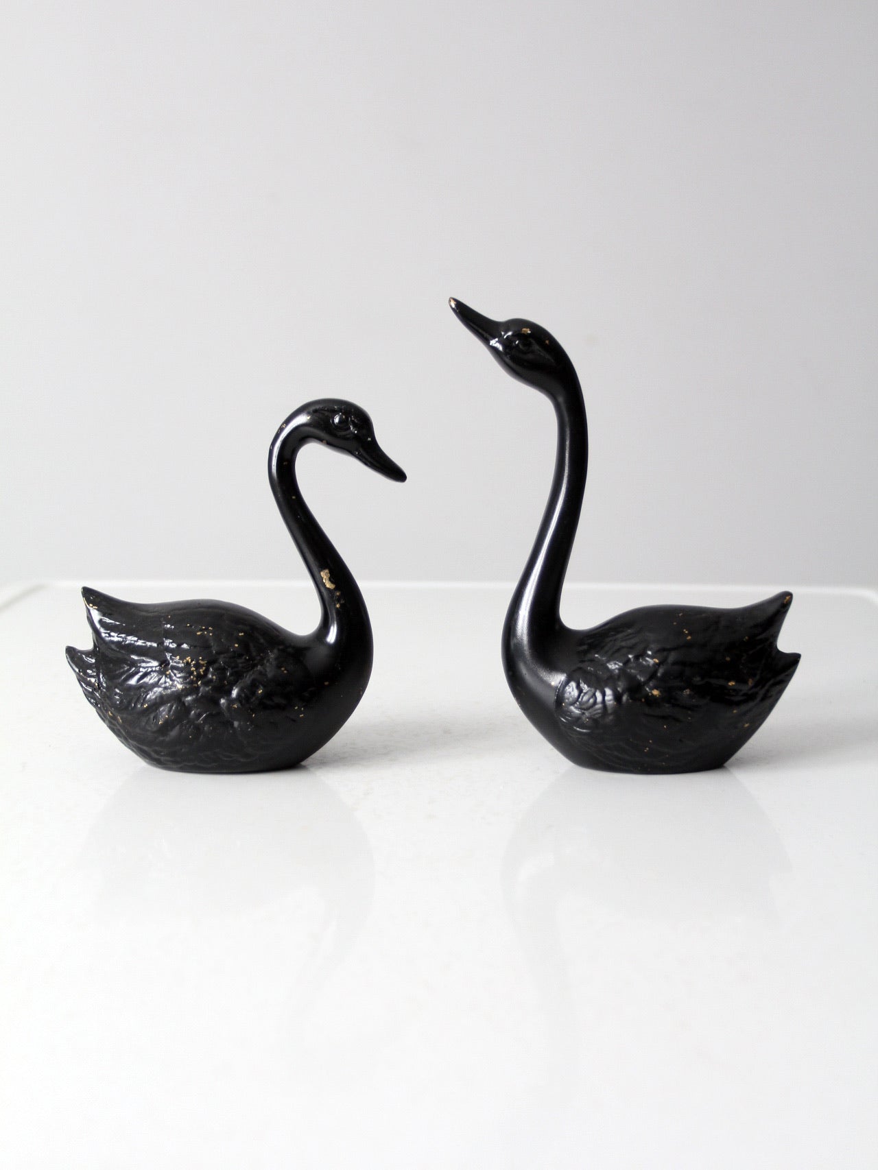 mid century painted black brass swans pair
