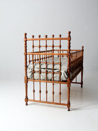antique Victorian wooden frame bed