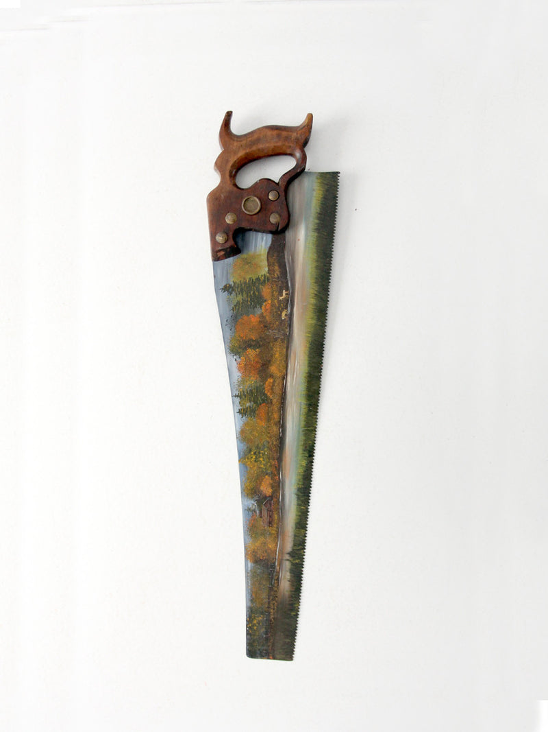 vintage folk art painting on Atkins hand saw