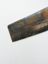 vintage folk art painting on Atkins hand saw