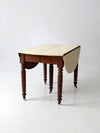 antique drop leaf table with fifth leg