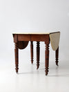 antique drop leaf table with fifth leg