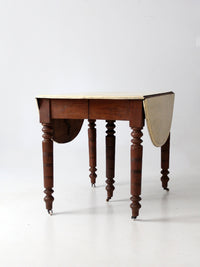 antique drop leaf table with fifth leg