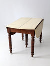 antique drop leaf table with fifth leg