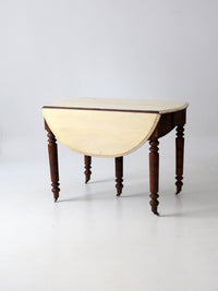 antique drop leaf table with fifth leg