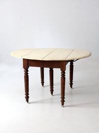antique drop leaf table with fifth leg