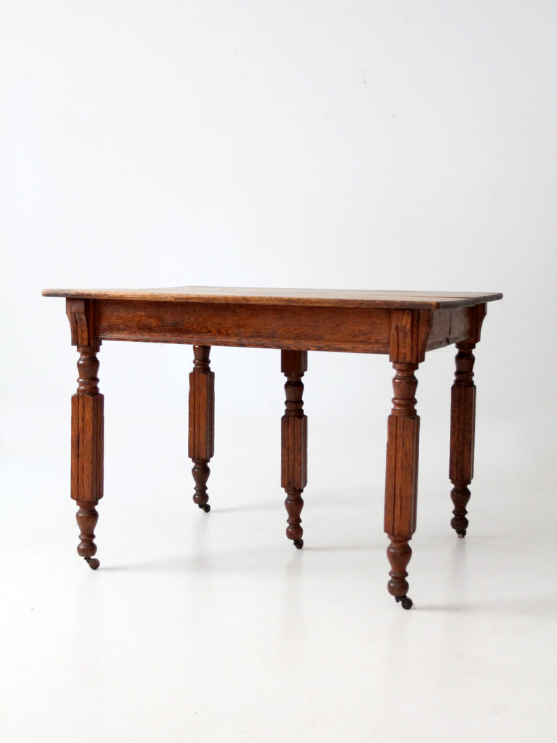 antique five leg dining table