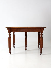 antique five leg dining table