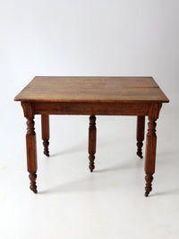 antique five leg dining table