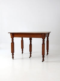 antique five leg dining table