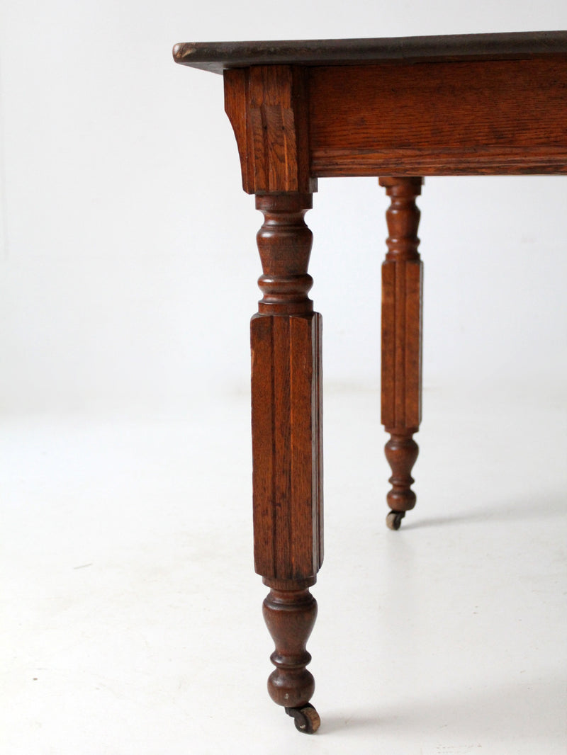 antique five leg dining table