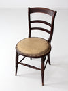 antique accent chair with ladder back