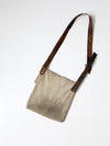 vintage textile and leather messenger bag