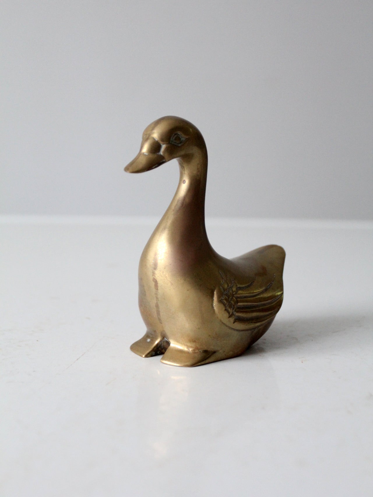 mid-century brass bird figurine