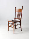 antique pressed back chair with leather seat